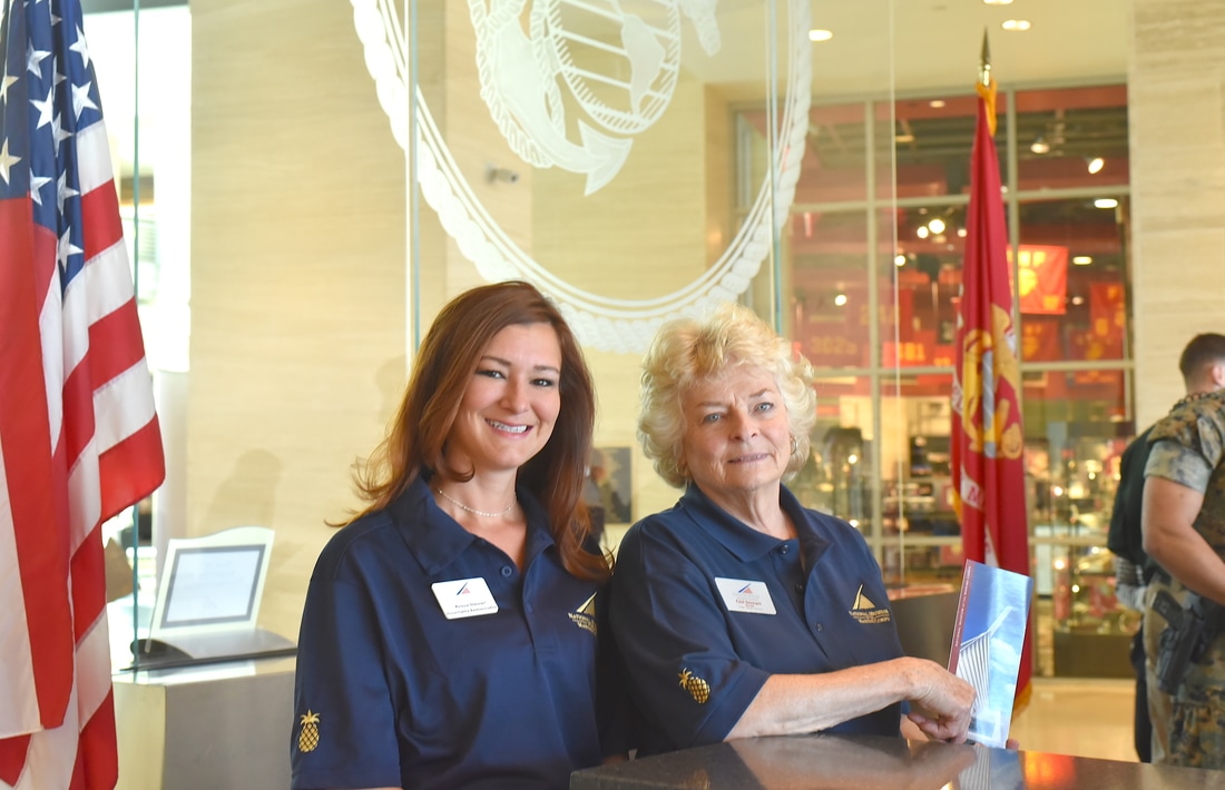 Ambassadors at the front desk of the Museum